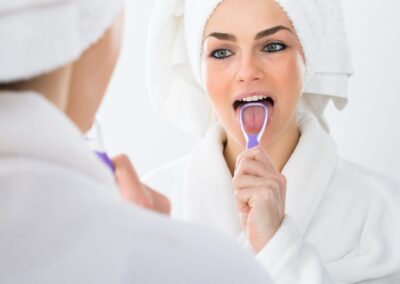 Should I Be Using a Tongue Scraper? | Dentist Topeka